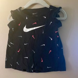 Black Nike t shirt for baby girls with pink grey and white swooshes